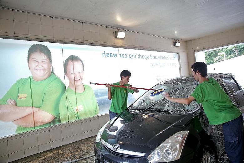Minds Wash, a car wash operated by the Movement for the Intellectually Disabled of Singapore. There have been more office jobs for people with disabilities in recent years, but associations say a large portion of jobs are entry-level, manual roles.