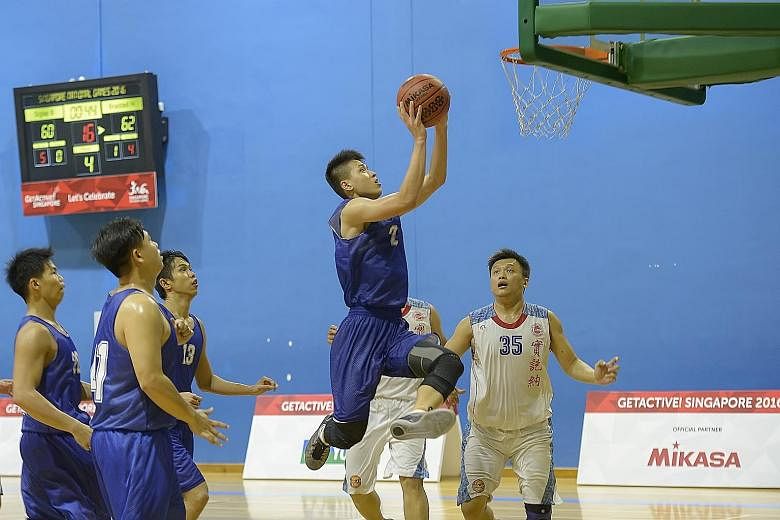 Braddell Heights forward Leon Kwek going up for a basket against Siglap in the Singapore National Games, which conclude tomorrow.