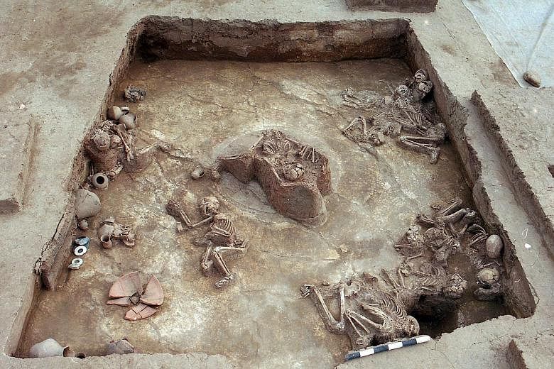 Right: Skeletons of earthquake victims found in an excavated cave dwelling at Lajia, Qinghai province, in 2000. Far right: An ancient landslide once blocked the Yellow River at Jishi Gorge, shown here.