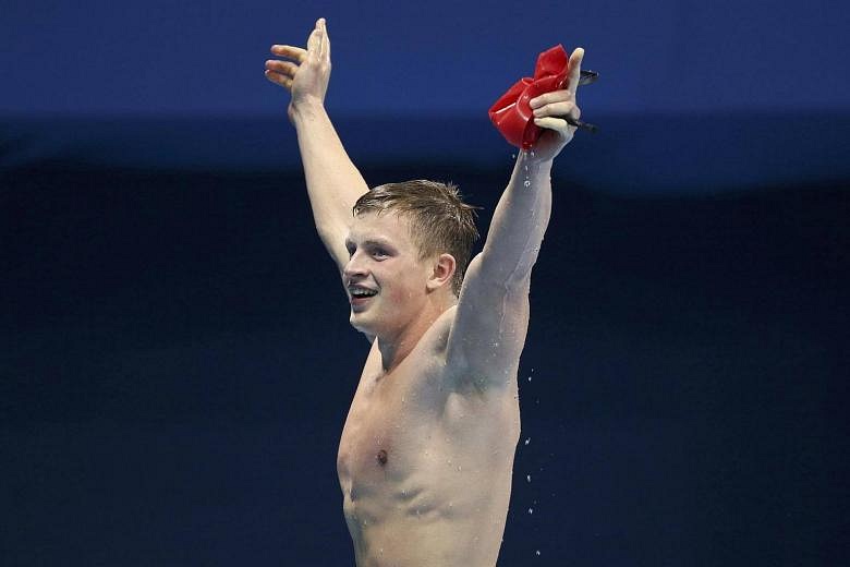 Olympics: Peaty wins men's 100m breaststroke gold in world record time ...