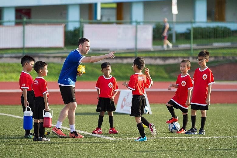 Mr Kenneth McGeough is one of the 20 volunteers with the Play It Forward initiative. A former Under-21 player with Irish top-tier team Shamrock Rovers, he coaches children under 12 in football at the Queenstown Stadium.