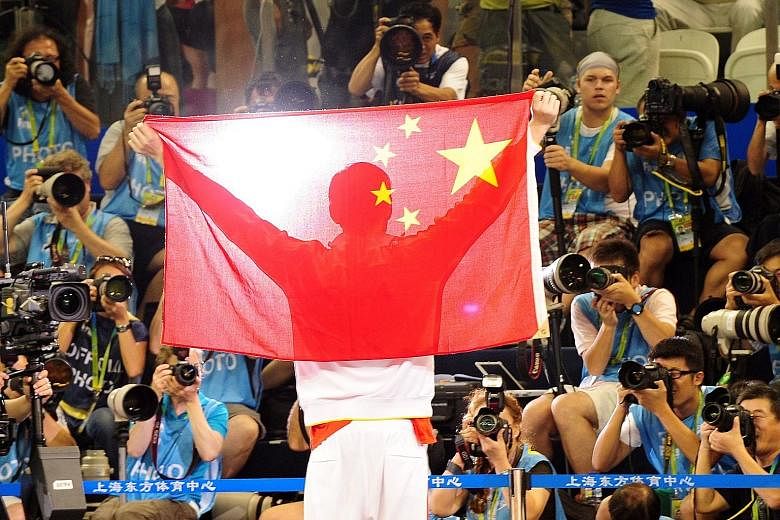 Above and top, left: The controversy over the Chinese flags being used at the Rio Olympics revolves around the orientation of the four small stars on the flags and the way in which they should be placed in relation to the main star.