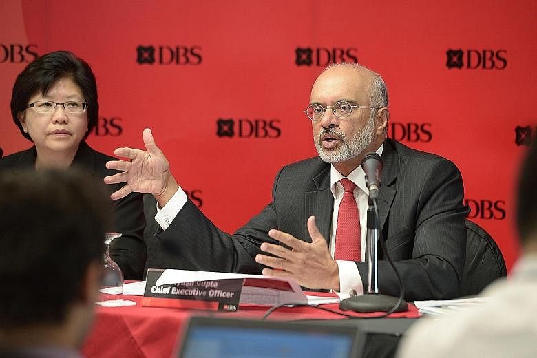 DBS chief financial officer Chng Sok Hui and CEO Piyush Gupta at the briefing yesterday. Mr Gupta said Swiber's woes were just a one-off in DBS' oil and gas portfolio, adding that it has otherwise stayed on track for another year of growth. DBS' tota