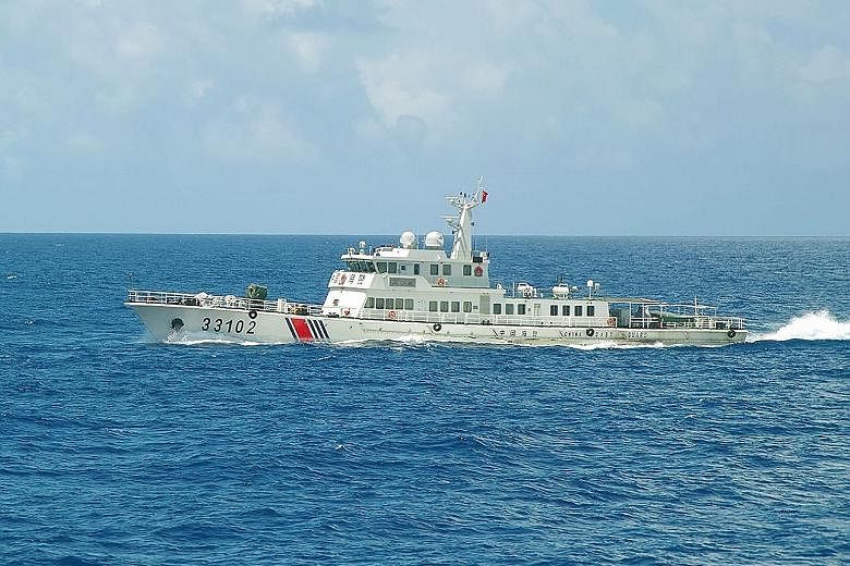 A Chinese coast guard ship sailing near disputed East China Sea islands on Sunday. Since Friday, Japanese officials have repeatedly protested against what Tokyo calls "intrusions" by Chinese ships in the territorial and contiguous waters of the islan