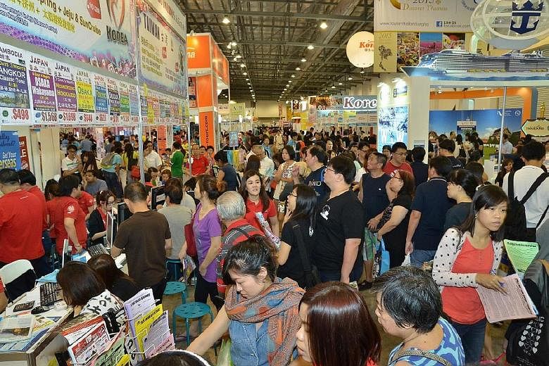 The crowd at the Natas Travel Fair last year. This year's Natas fair is on from Friday to Sunday. The Travel Revolution fair will be on from Aug 19 to 21. Admission to both fairs is free.