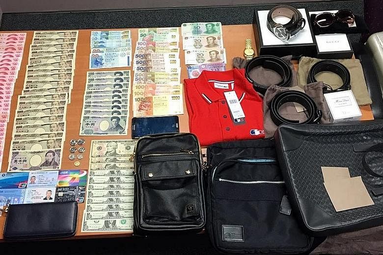 Foreign currencies, wallets, belts, bags, watches and perfumes were seized from the three accused from China. They are believed to be part of a pickpocketing syndicate.