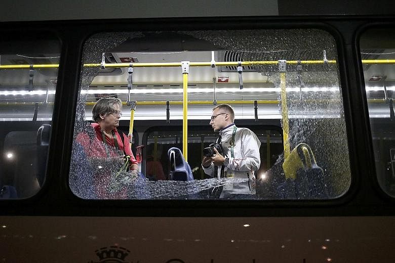 Broken windows on an official media bus which shattered when journalists were driven from the Main Transport Mall from the Deodoro venue were originally feared to be caused by gunfire. But it turned out to be an "act of vandalism" carried out with ro