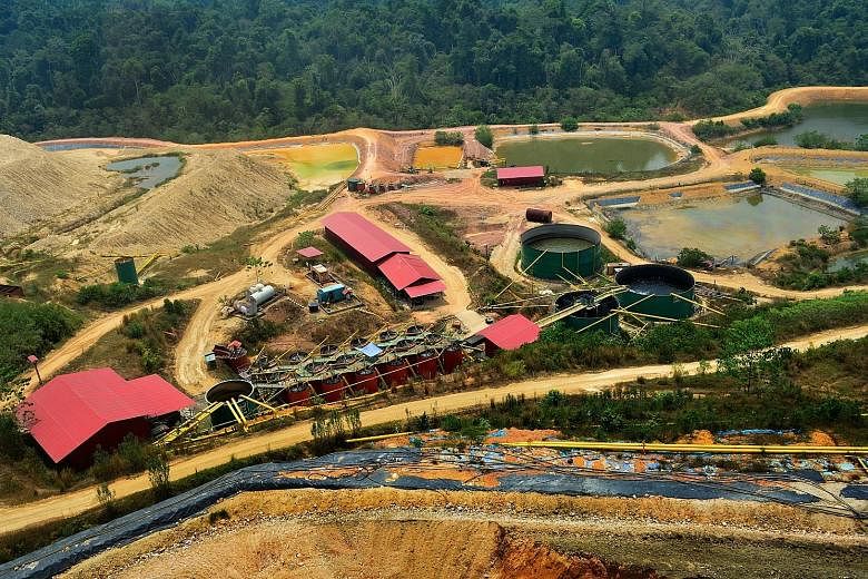 An aerial view of a part of the CNMC goldmine in Kelantan. The company said yesterday that it will focus on increasing production and improving operational efficiencies to keep costs low.