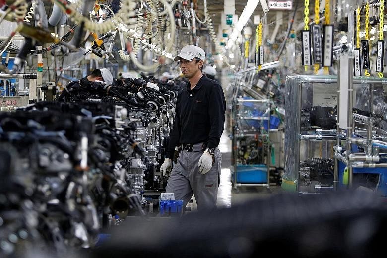An assembly line of V6 engines at a Nissan plant in Fukushima. Forecasts for gains in machinery orders in July-September suggest that the economy could pick up from what is likely to be a subdued performance in April-June.