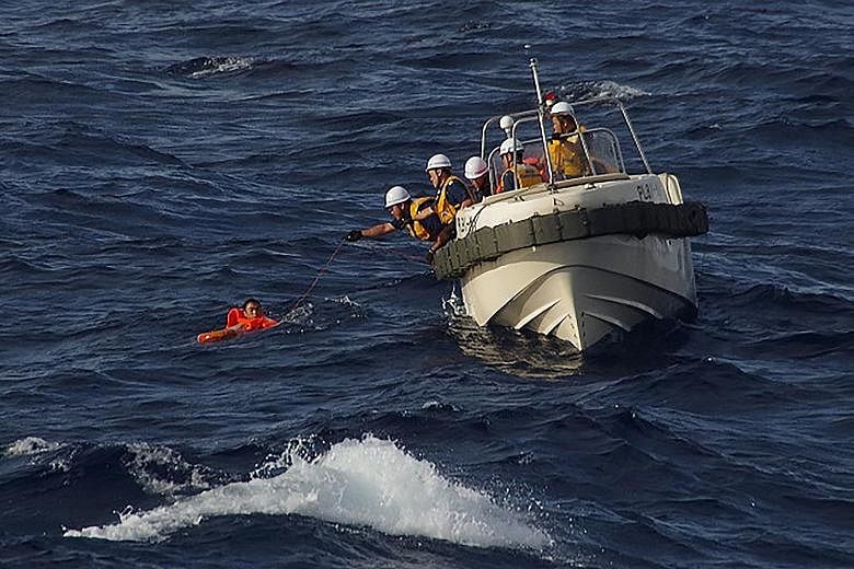 Japanese coast guard rescuing a crew member of the Chinese fishing boat that sank in waters near disputed islands in the East China Sea. China has expressed its appreciation for the rescue efforts.