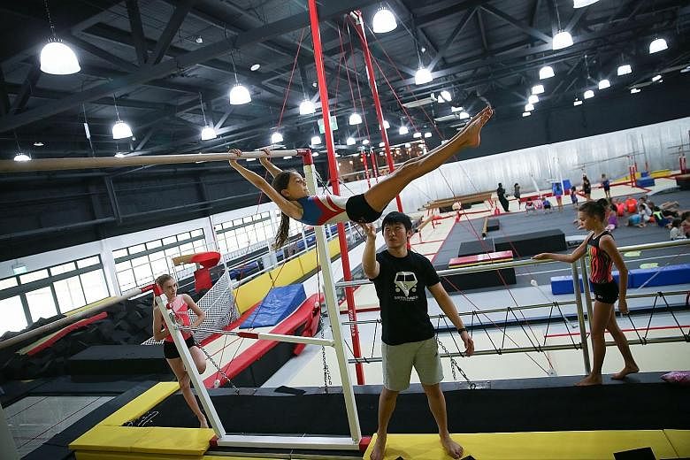 The Yard conducts gymnastics classes for children and adults.