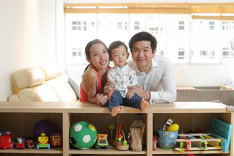 Mr Wong at home with his wife, Ms Loo Hoey Lit, and their 17-month-old son Zii Xiang. Mr Wong, who owns a software-development firm, calls his CPF funds his retirement "safety net" . His aim is to have enough money in his Special Account by age 45, s