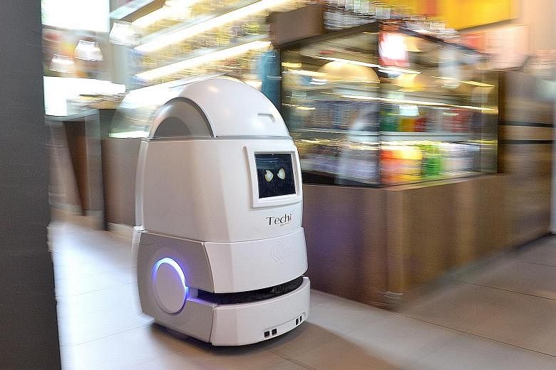 This Techi robot with eyes, which can deliver room-service orders on its own, will join the team at Park Avenue Rochester Hotel in two weeks. The hotel's other two Techi robots, which started work last month, can together perform the job of three ful