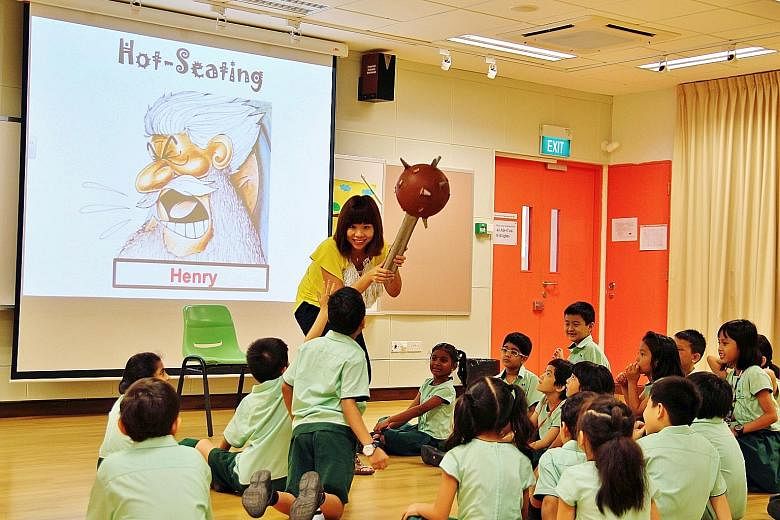 A teacher and her pupils role-playing during a process drama lesson at Farrer Park Primary School.