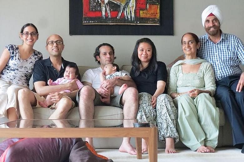 Mr Nagpal and his wife Pushpinder, with (from left) daughter Parveen, son-in-law Bhubhindar Singh Bhandal (holding granddaughter), son Randeep (with grandson in arms) and daughter-in-law Yuhana.