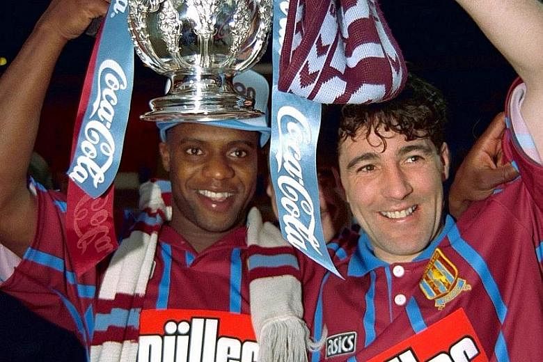 Aston Villa's Dalian Atkinson (left) and Dean Saunders celebrating their English League Cup win over Manchester United in 1994.