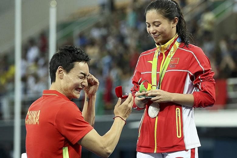 Qin Kai is set to plunge into marriage with fellow diver and fiancee He Zi, after he presented her with an engagement ring following the medal presentation for the 3m springboard final. The pair have been dating for six years. In the medal stakes, sh
