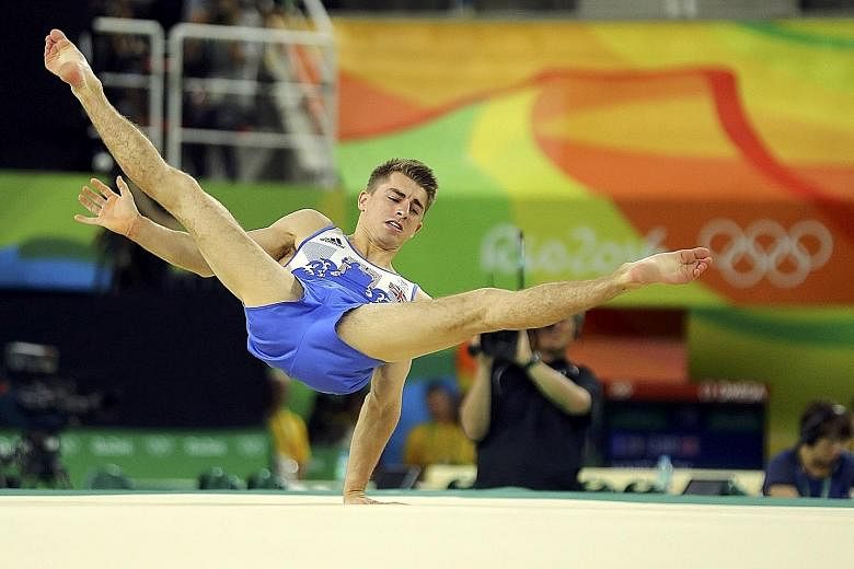 Max Whitlock performing a routine in the floor final, which he won to earn Britain their first Olympic gold medal in gymnastics. He later added a second gold on the pommel horse apparatus.