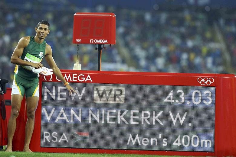 South African Wayde van Niekerk finishing the 400m in 43.03sec, leaving defending champion Kirani James of Grenada (lane six, 43.76) and American LaShawn Merritt (43.85), Beijing 2008 gold medallist, trailing in his wake.