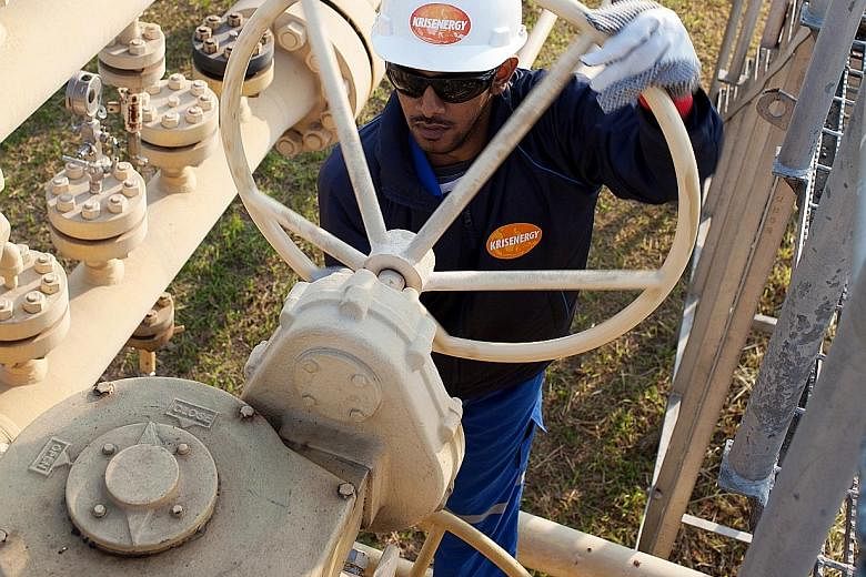 A worker at a KrisEnergy site. The energy company has 19 contract areas in Bangladesh, Cambodia, Indonesia, Thailand and Vietnam.