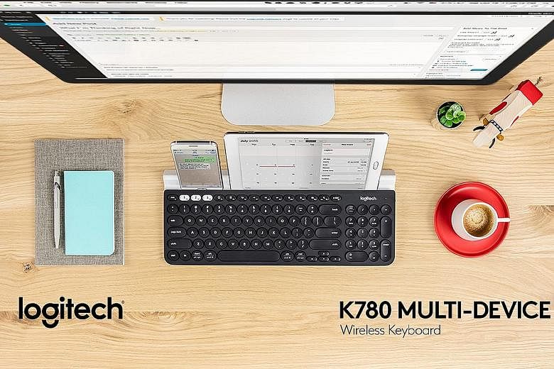 The Logitech K780 can connect up to three devices using both Bluetooth and the USB adapter at the same time.