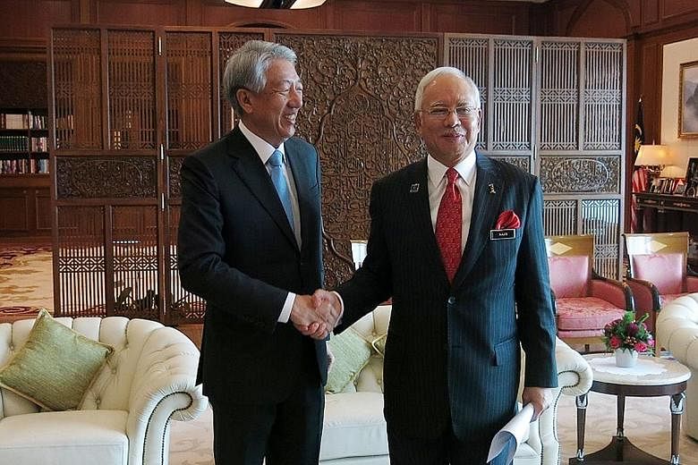 Mr Teo with Mr Najib during his visit to Putrajaya, where Singapore's good relations and cooperation with Malaysia were underlined.