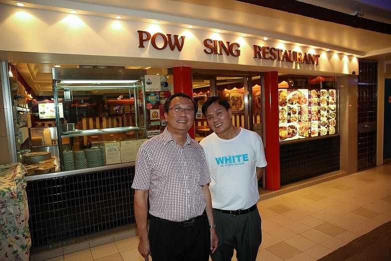 Pow Sing Restaurant director Steven Tan (left) and Pow Sing Kitchen director Lee Chin Soo received news yesterday afternoon that their operating licence suspensions had been lifted.