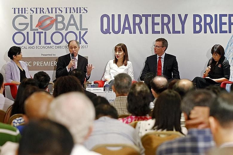 From left: ST managing editor Fiona Chan, who moderated the discussion, British High Commissioner Scott Wightman, ST foreign editor Audrey Quek, Bank of Singapore's chief economist Richard Jerram and ST assistant foreign editor Tan Dawn Wei at The St