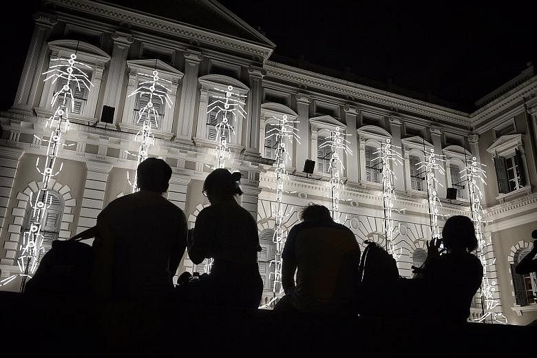 The facade of the National Museum of Singapore becomes a playground for 98 LED stickmen in Keyframes, a light installation by French art collective Groupe LAPS that is part of the Singapore Night Festival. The ninth edition of the festival returns to