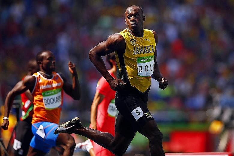 Usain Bolt was untroubled while winning the ninth heat of the 200m on Tuesday. The Jamaican, who danced during his warm-up, was relaxed as he clocked 20.28sec as rival Justin Gatlin won the fifth heat in 20.42.