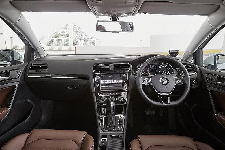 The 1.6-litre Subaru Levorg GT-S (far left) has a sporty cockpit (top), while the 1.4-litre Volkswagen Golf Variant R-Line (left) has a dashboard (above) that is equipped with intuitive infotainment controls.