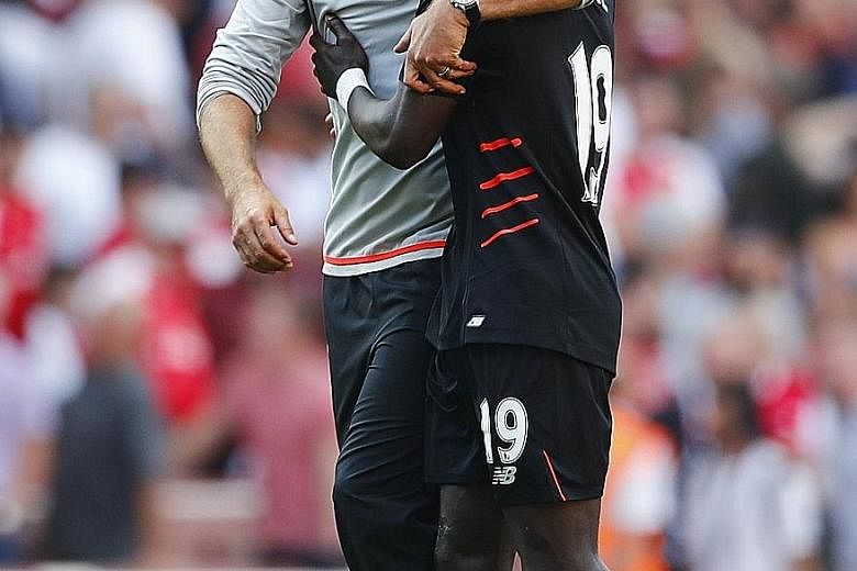 Liverpool manager Jurgen Klopp celebrating with Sadio Mane after the 4-3 victory over Arsenal in their English Premier League opener last Sunday.