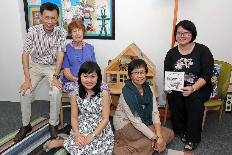 From left: Mr Steven Soh, 47; Mrs Dorothy Lau, 83; Ms Valerie Oh, 36; Mrs Juliana Toh, 56; and Ms Grace Lim, 41, form the team which brought out a new book, Becoming, as part of the Counselling and Care Centre's 50th anniversary.
