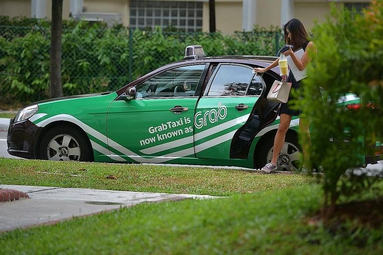 Uber and Grab are going to be disrupted as the next round may see a taxi service using driverless cars, said PM Lee. Singapore will be starting a trial of driverless taxis in one-north next year.