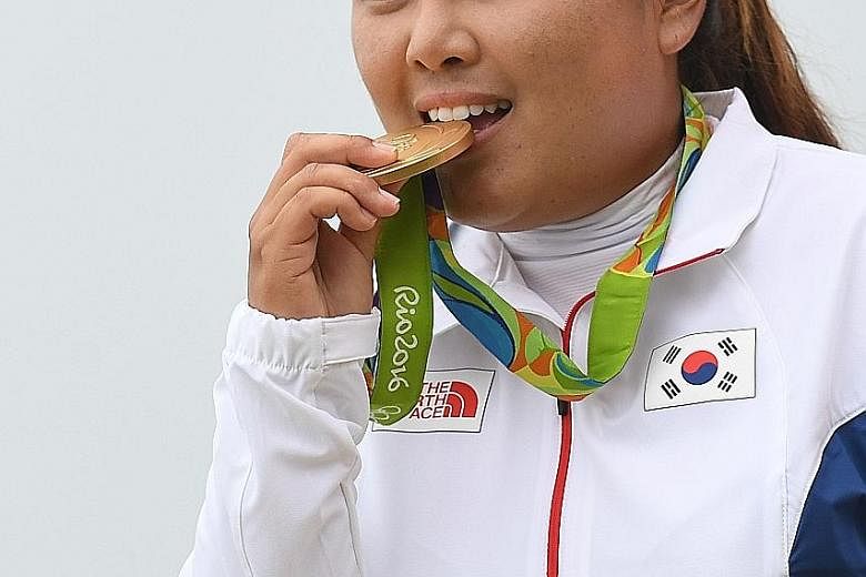 South Korean golfer Park In Bee putting the malleability of her gold medal to the test. The golf competition's return to the Olympics have been widely recognised as successes, despite multiple withdrawals in the men's field.