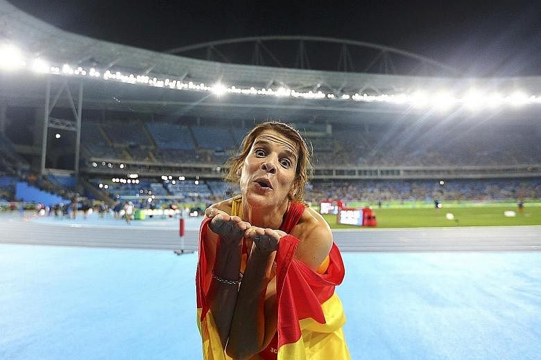 Ruth Beitia of Spain celebrating her high jump victory on countback, after four women cleared 1.97m on Saturday.