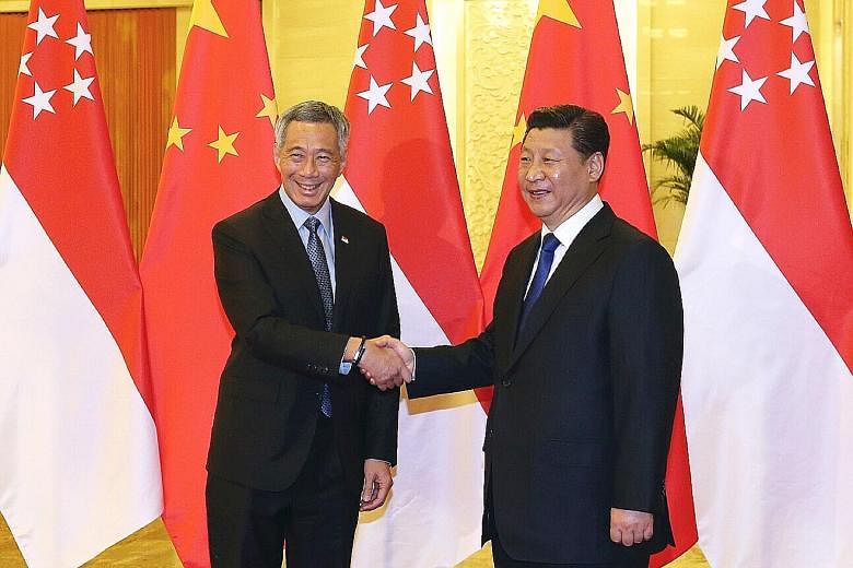 Mr Lee with Chinese President Xi Jinping at the Great Hall of the People in Beijing in November 2014. Singapore's relationship with China is much broader than the single South China Sea issue, said Mr Lee.
