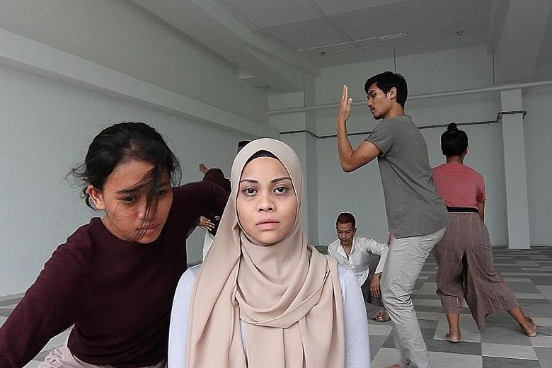 Siti Aisyah Kamin (foreground centre) will perform in the dance production, Manusia - Siapakah Kita Di Bumi Ini.