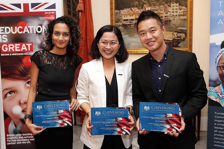 This year's Chevening Scholarship recipients (from left) Ms Sathyavani Sathisan, 32; Ms Karen Chin Ai Ying, 41; and Mr Aw Cheng Wei, 27, at a ceremony in Eden Hall yesterday. The bond-free scholarships are awarded to emerging leaders in their field f