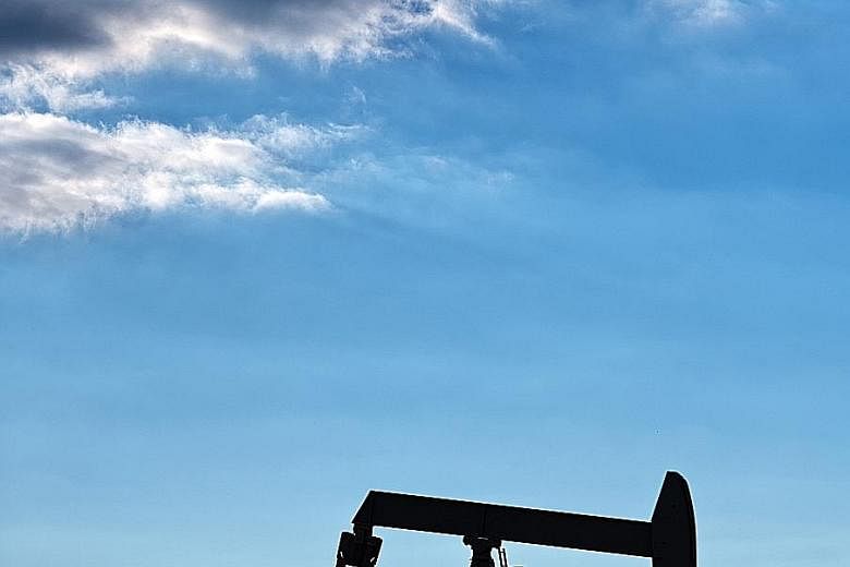 A pump jack operating in an oil field near Corpus Christi, Texas, in January. US petrol stockpiles probably shrank by 1.5 million barrels for a fourth week of declines, according to the median estimate in a Bloomberg survey.