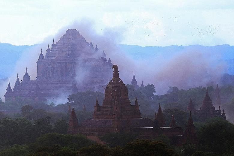 The ancient Dhammayangyi temple is shrouded in dust after a 6.8-magnitude earthquake hit Bagan in Myanmar yesterday.