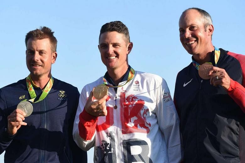Rio gold medallist Justin Rose (centre), flanked by Henrik Stenson (silver, left) and Matt Kuchar (bronze). Rose wants to ensure that his form at The Barclays shows he can "put a run together". 
