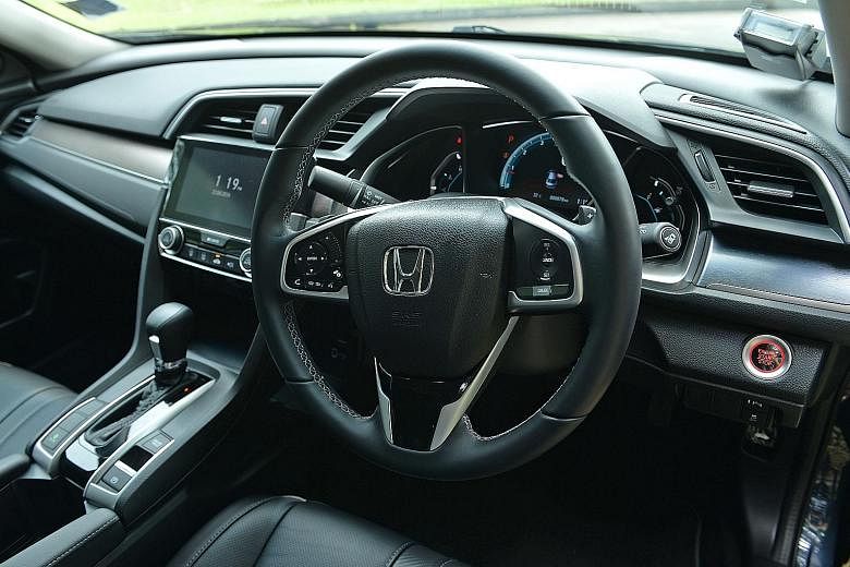 [ ]The Honda Civic 1.5 has a well-laid-out cockpit that comes with features such as a steering-mounted cruise control and touchpad-style volume control. [/ ]