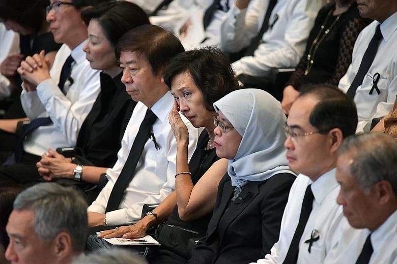 The funeral service booklet, in honour and memory of Mr Nathan's lifetime of achievements and his dedicated service to Singapore. Government leaders and their wives who attended yesterday's funeral service included (above, from left) Mr and Mrs Lim S