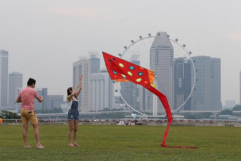 People were out and about at Marina Barrage at 5pm yesterday. The three-hour PSI was 83 then, according to the NEA website.