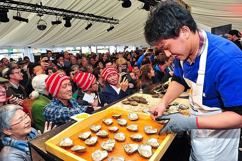 The oyster- shucking championship (above) is one of the highlights at Ireland's Galway International Oyster & Seafood Festival.
