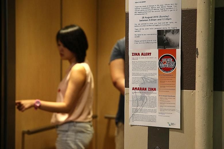 Leaflets on the Zika virus at the lift lobby of Block 102, Aljunied Crescent, where the first locally infected victim lives.