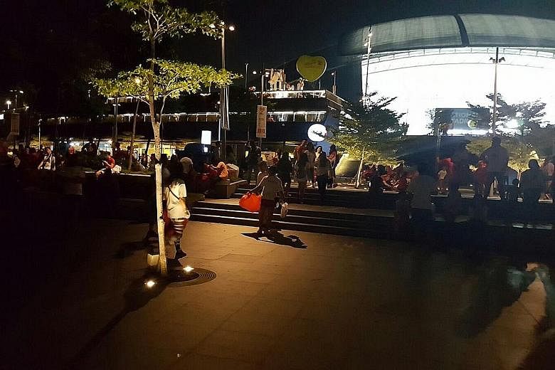 Many partygoers outside the National Stadium brought along their own trash bags, said a volunteer.