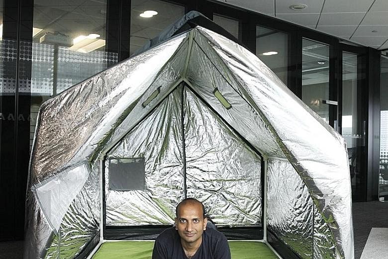 billionBricks co-founder Prasoon Kumar with the weatherHyde tent. In winter, the triple-layer cover provides insulation while reflective material on the inside traps body heat. In summer, the tent cover can be reversed to reflect solar heat so that p