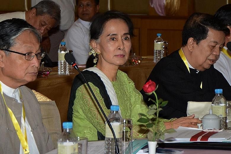 Ms Suu Kyi chairing a meeting in Naypyitaw in May in preparation for the talks, which will bring ethnic minority rebel leaders to the capital, along with military top brass and international delegates.